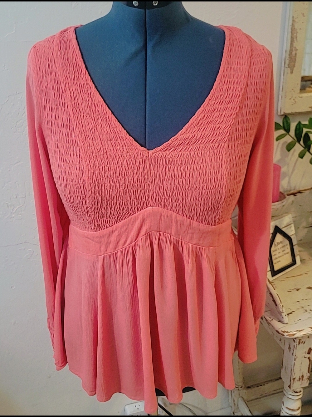 Torrid coral pink smocked V-neck Babydoll peplum blouse